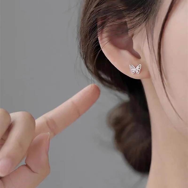 Hollow-out zircon butterfly earrings for women, summer forest style, versatile and fresh, Korean version niche earrings