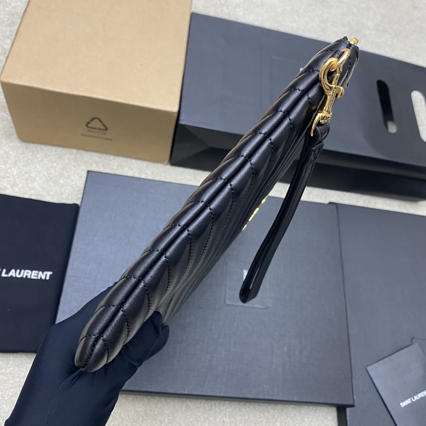 Saint Laurent Quilted Leather Clutch product photo from LabelPicks