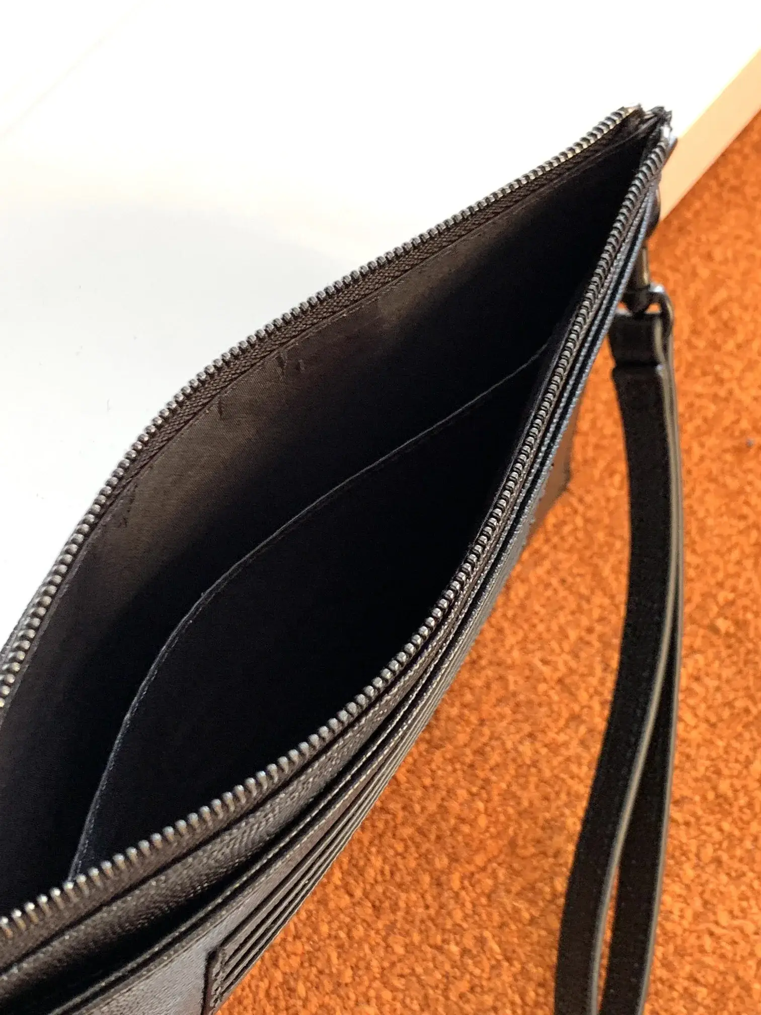 Saint Laurent Polished Clutch product photo from LabelPicks