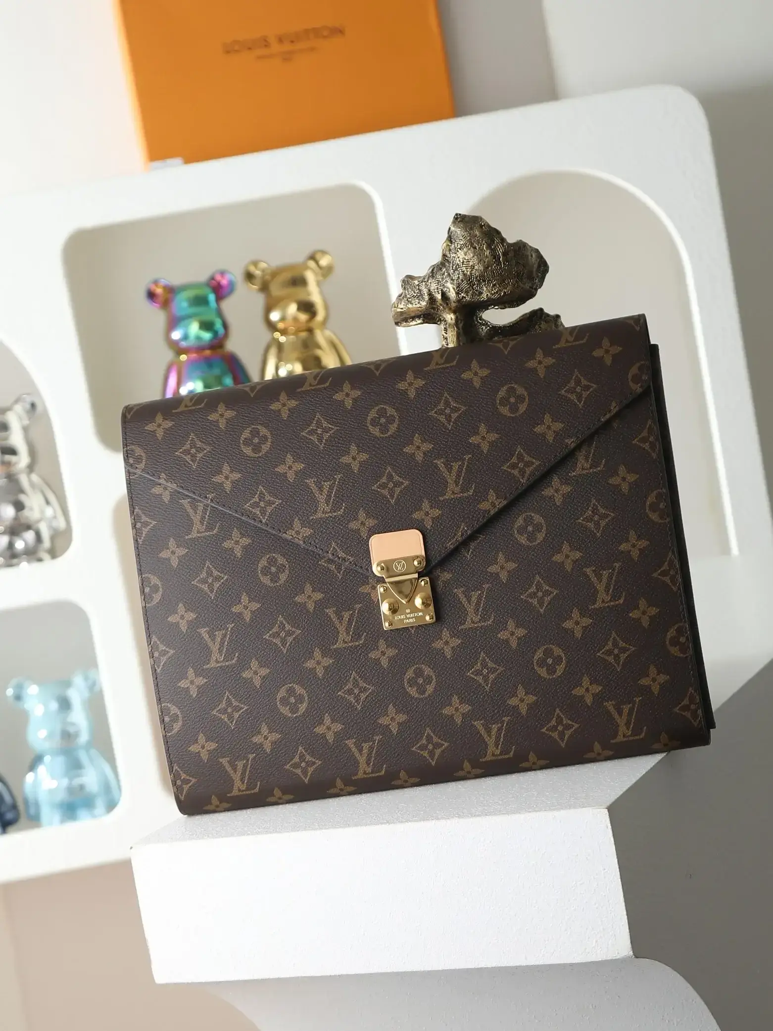 Louis Vuitton Brown Monogram Canvas Clutch product photo from LabelPicks