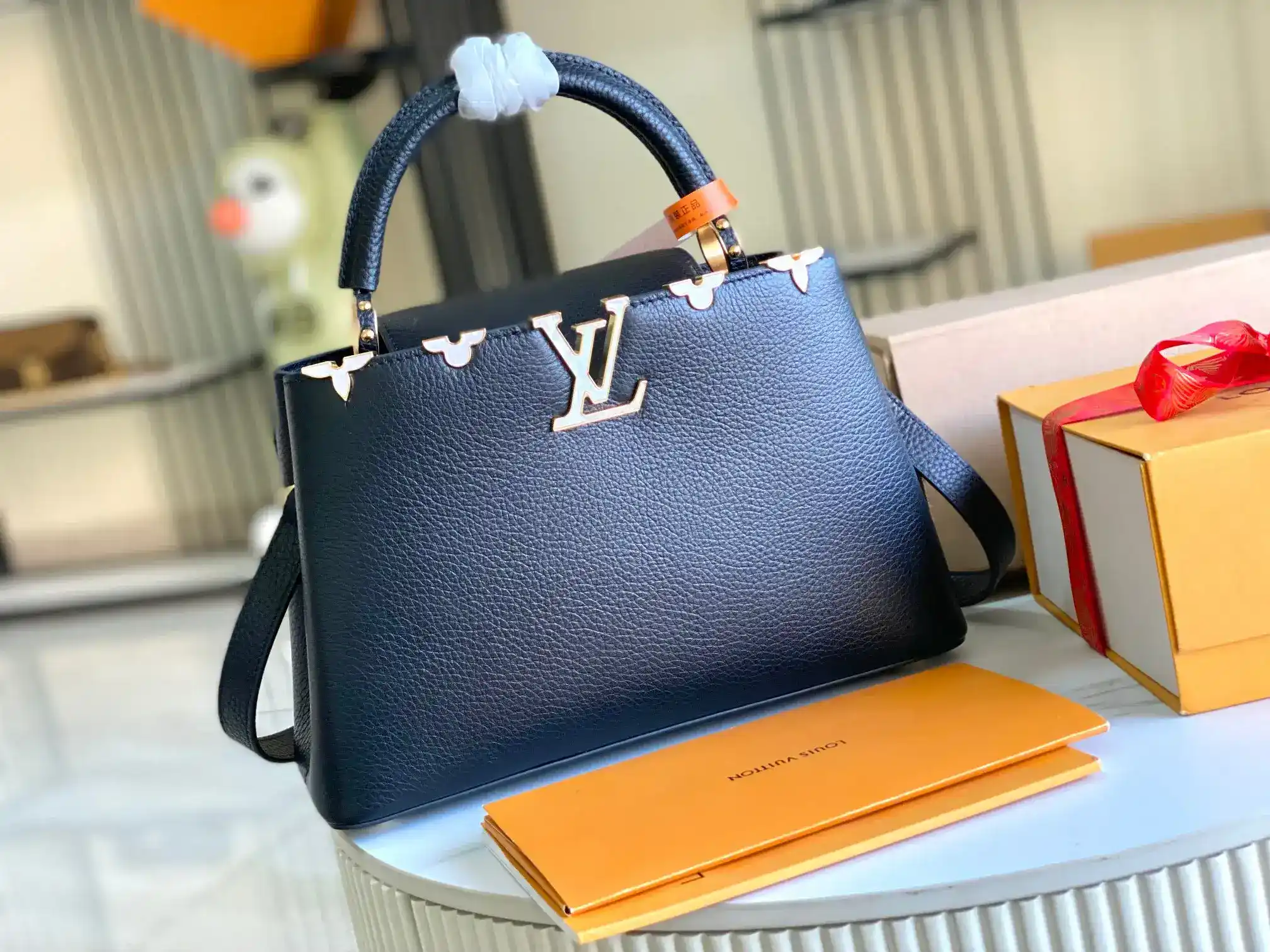 Louis Vuitton Capucines Black Grained Leather Crossbody Bag product photo from LabelPicks