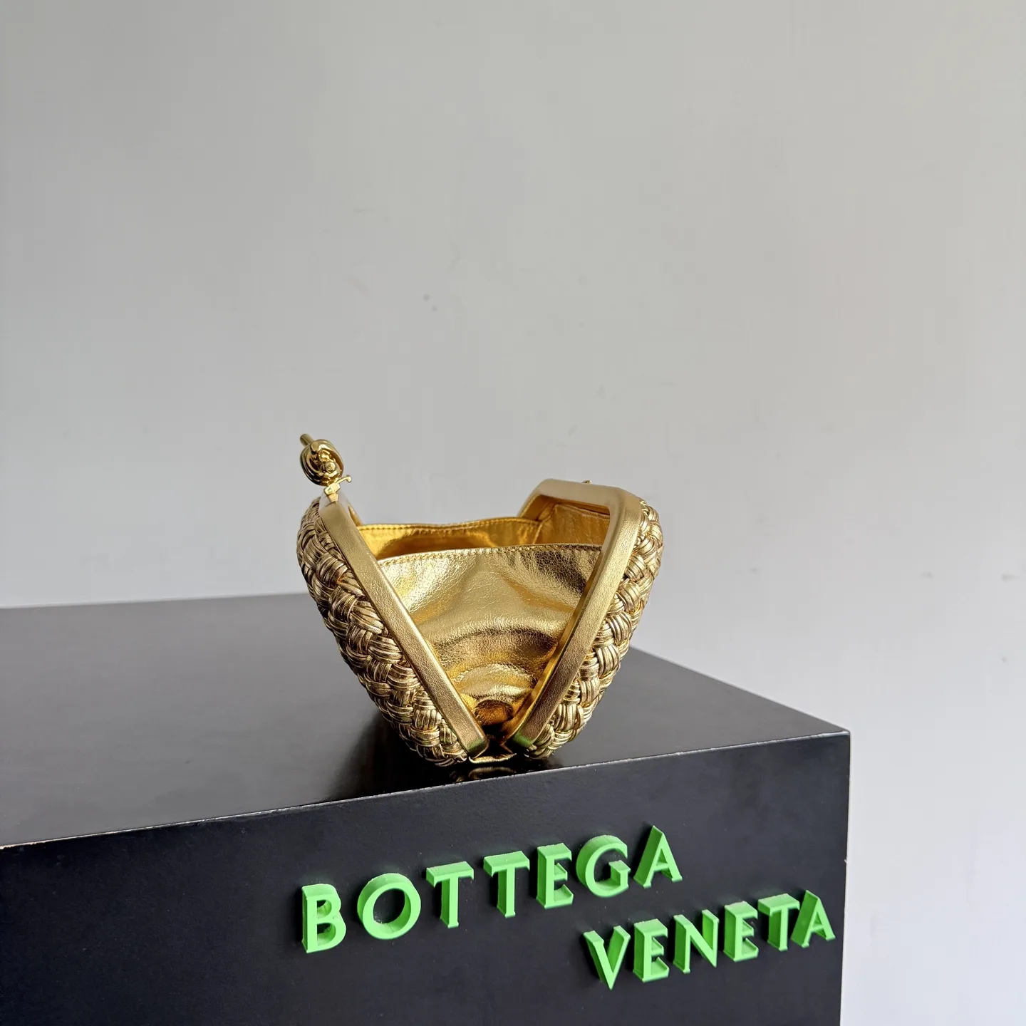 Bottega Veneta Intrecciato Woven Leather Knot Clutch product photo from LabelPicks