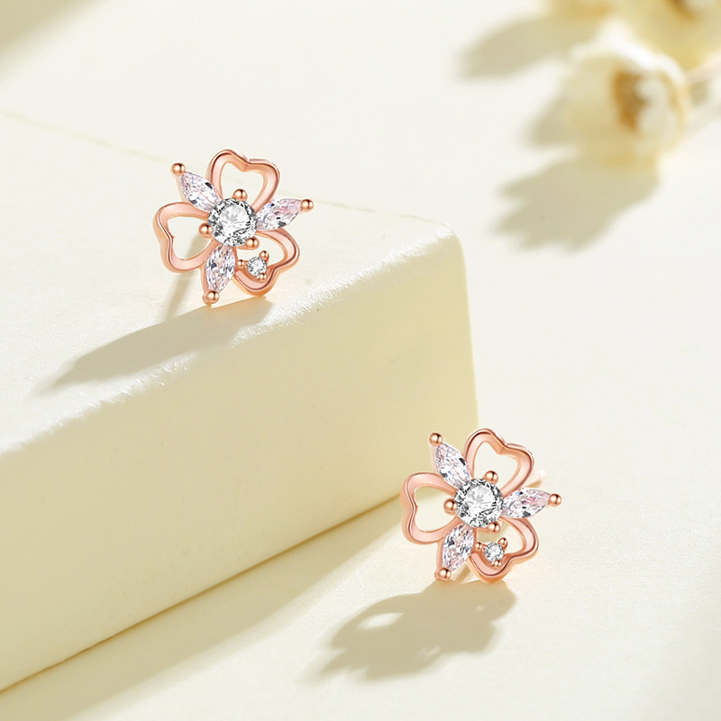 925 sterling silver clover snowflake earrings, featuring cubic zirconia flowers, a delicate and minimalist design, perfect for a forest-inspired look