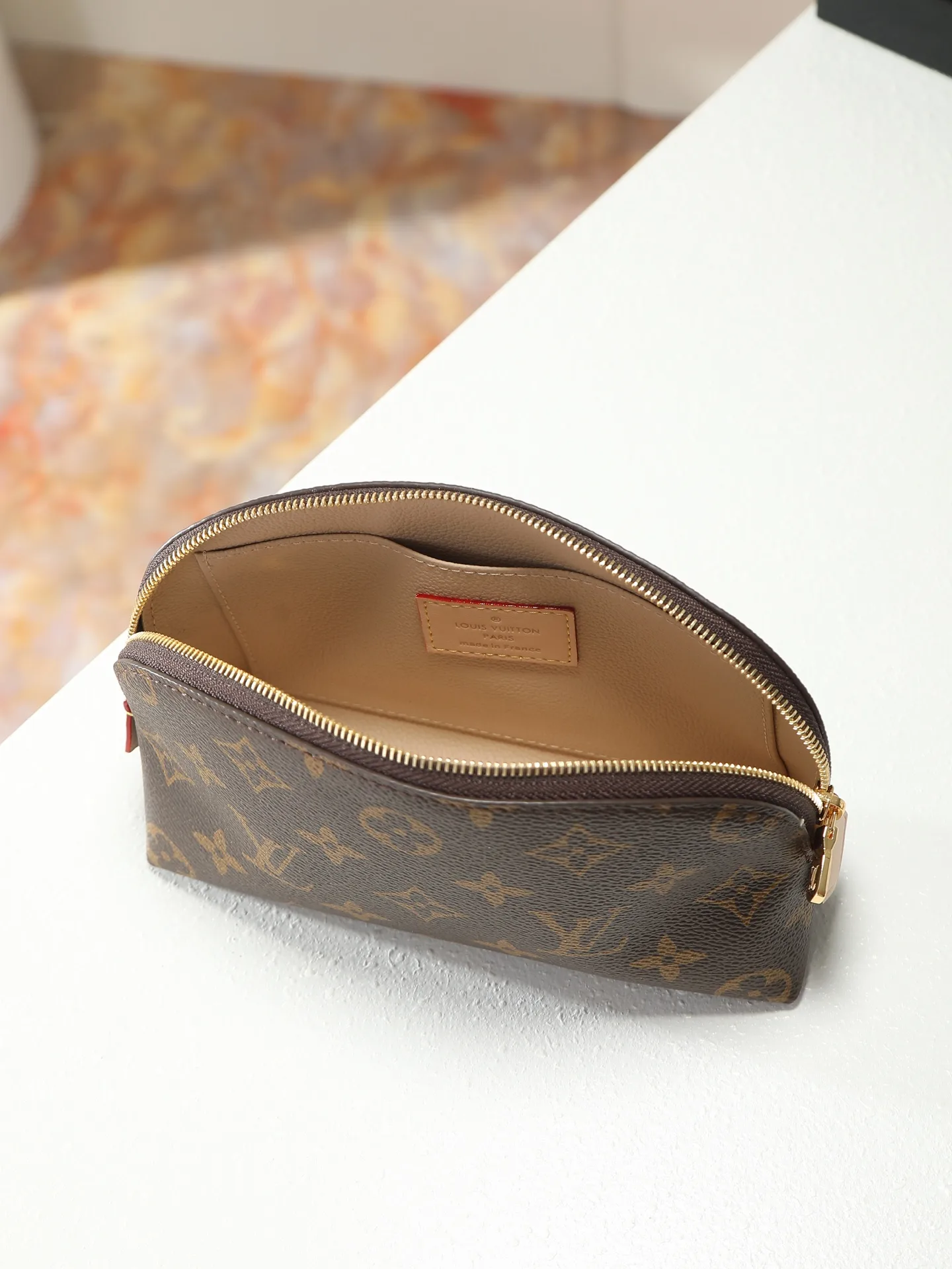 Louis Vuitton Sleek Clutch product photo from LabelPicks