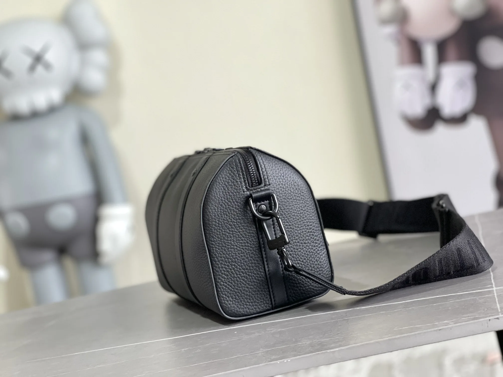Louis Vuitton Grained Leather Keepall Crossbody Bag product photo from LabelPicks