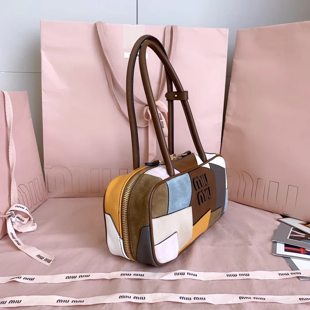 Miu Miu Canvas and Leather Top Handle Bag product photo from LabelPicks