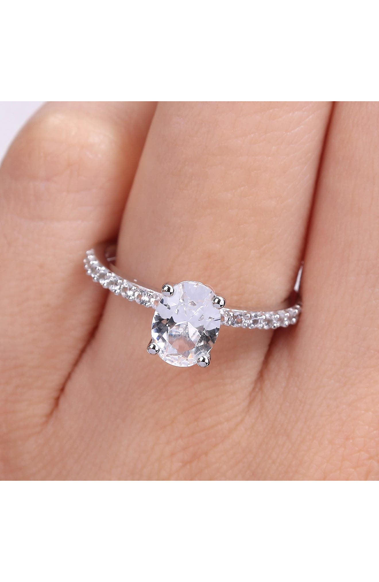 DELMAR 10K White Gold Plated Sterling Silver Oval Shape Created White Sapphire Ring