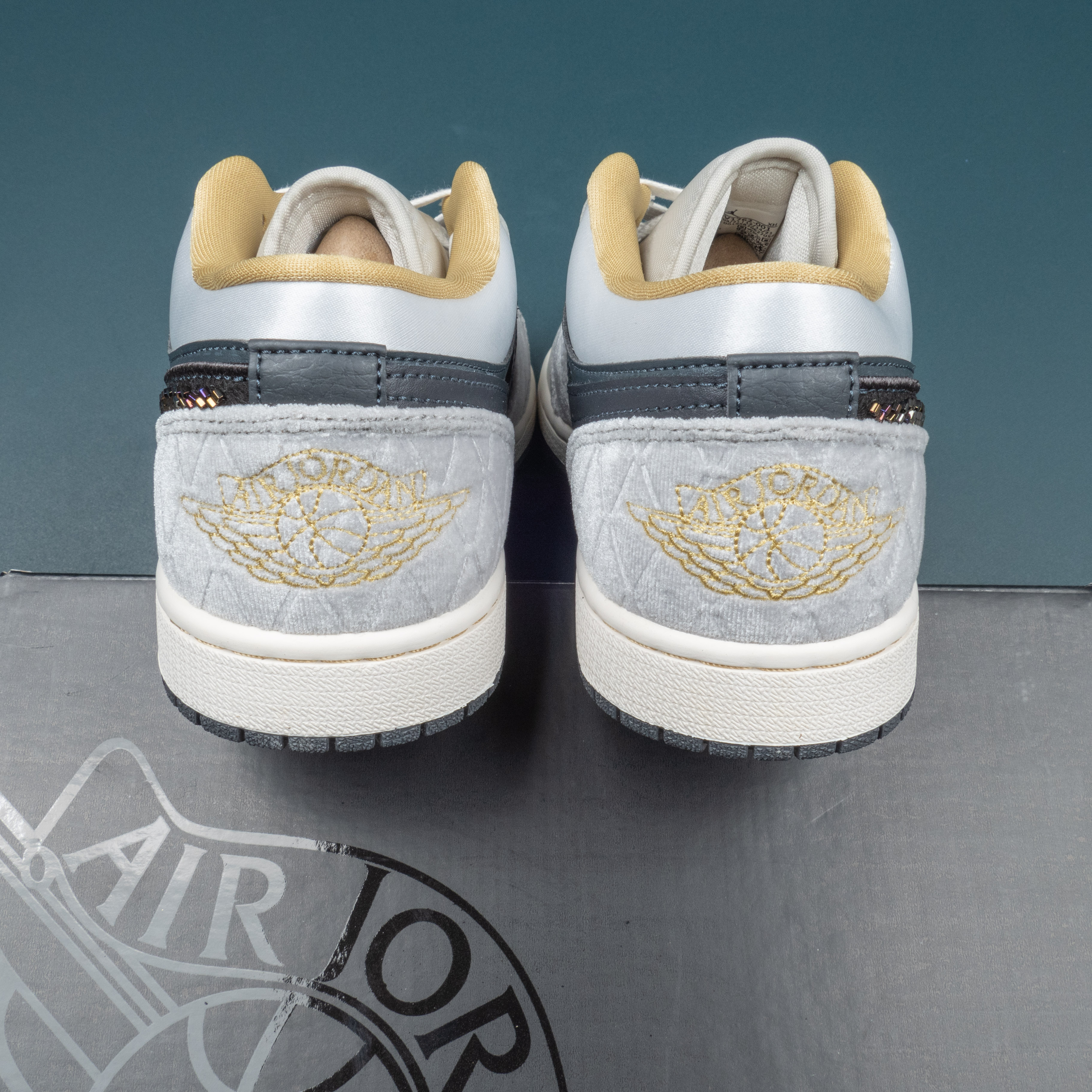 1‘s Low Beaded Swoosh