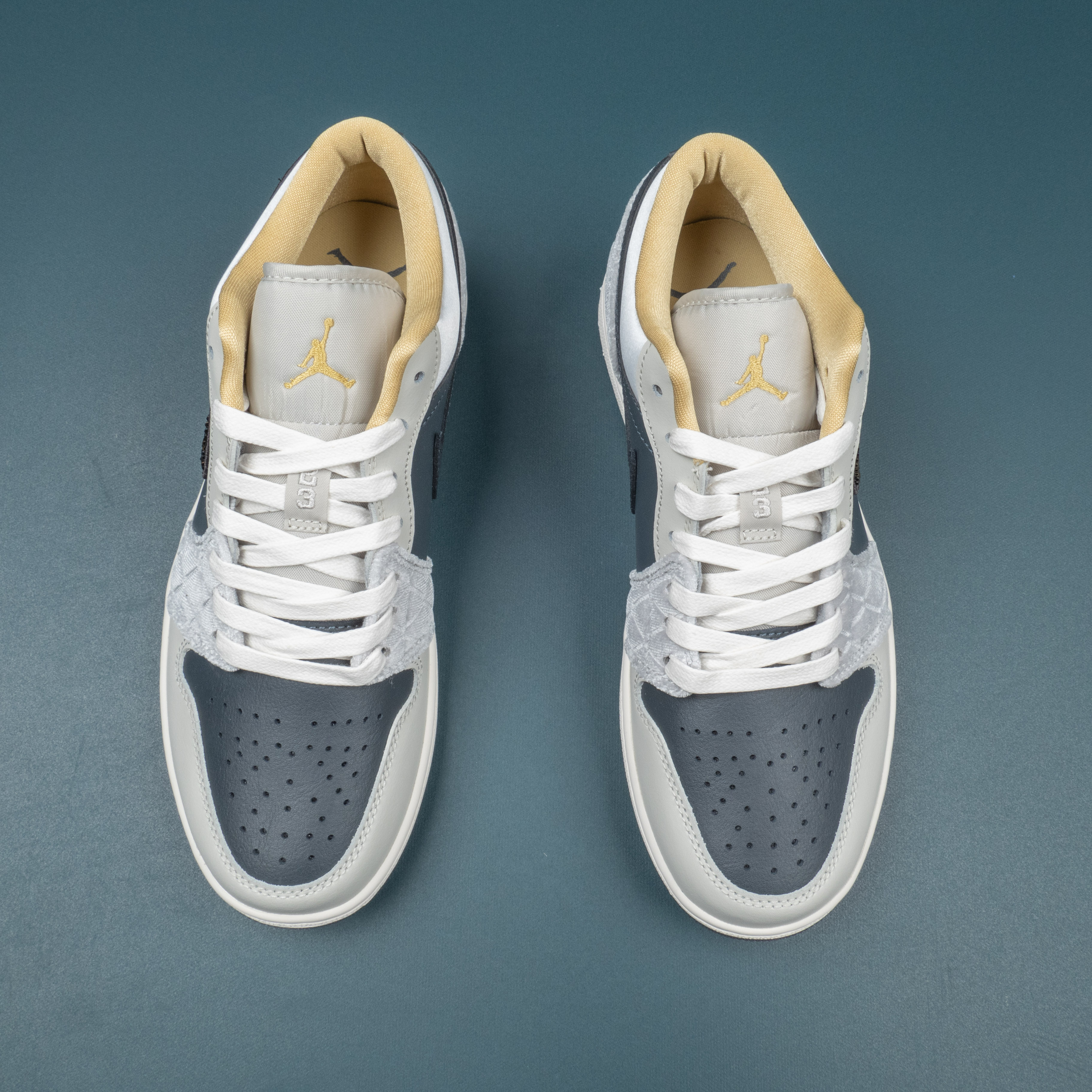 1‘s Low Beaded Swoosh