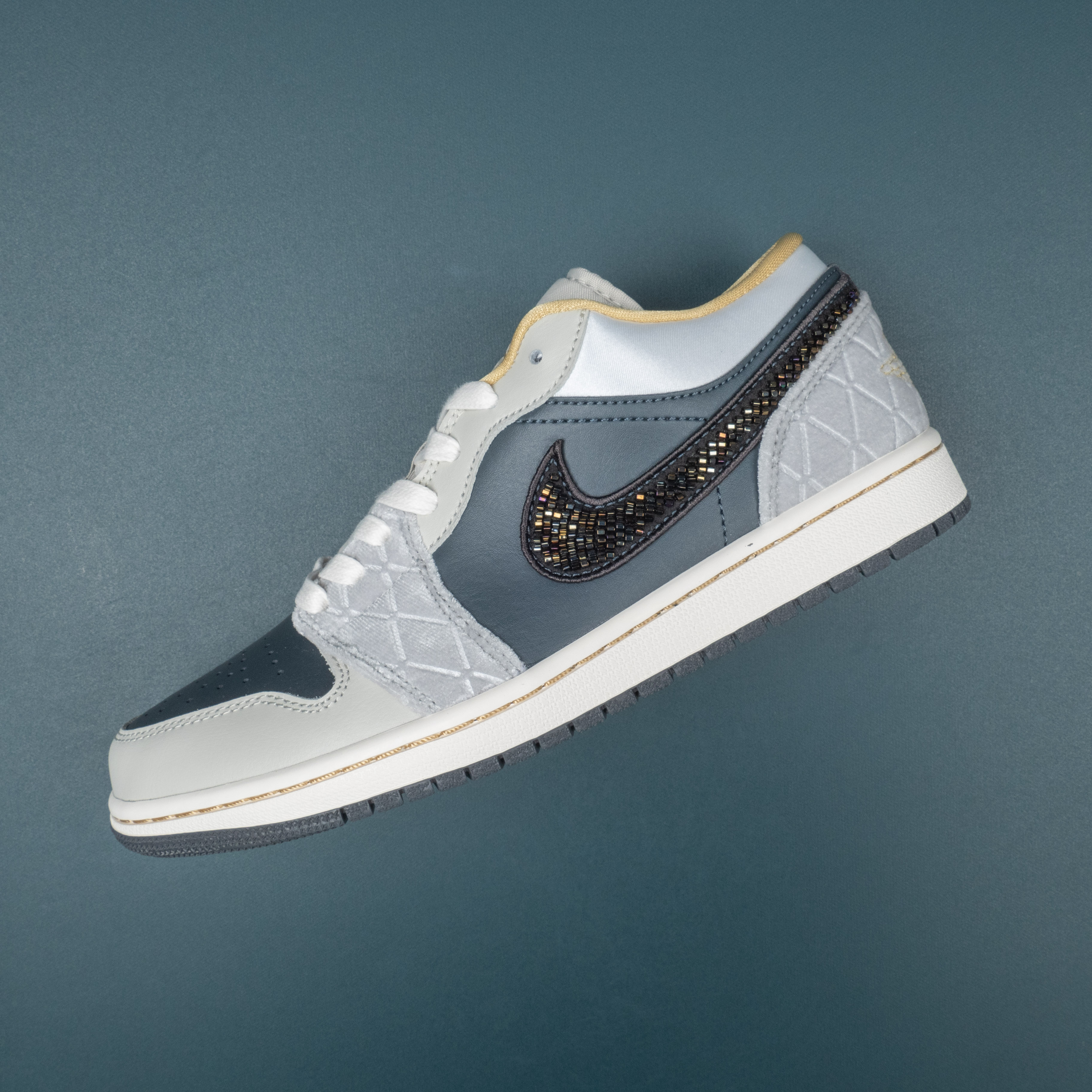 1‘s Low Beaded Swoosh