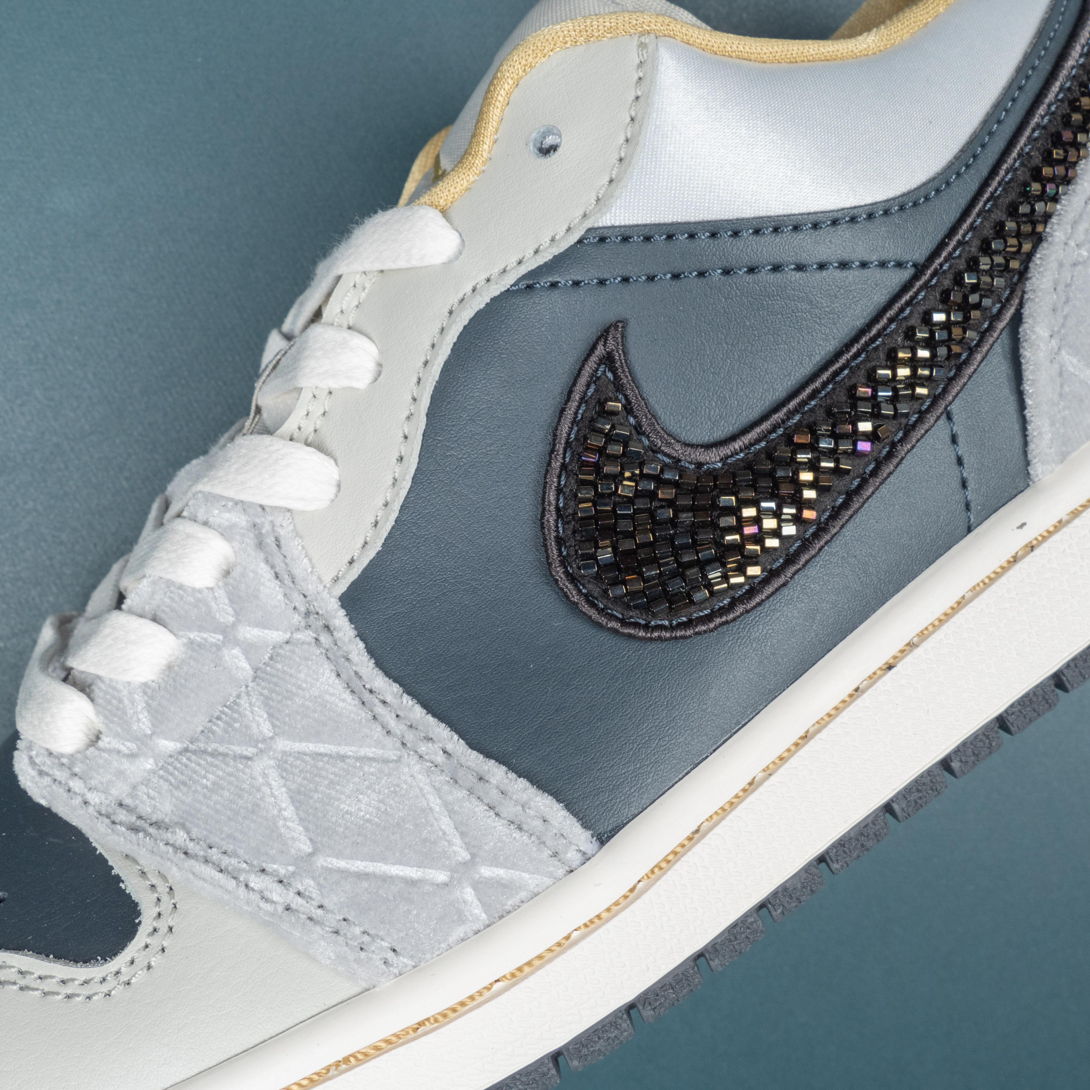 1‘s Low Beaded Swoosh