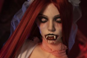 Zombie sex doll with bloodstained gown and sharp vampire teeth for horror enthusiasts