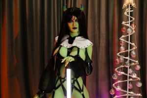 Green skin sex doll with seductive features and mystical allure