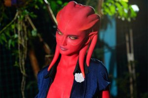 Alien fantasy sex doll with red skin and mesmerizing gaze