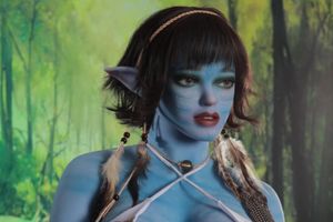 Orc sex doll with red skin, striking horns, and seductive outfit