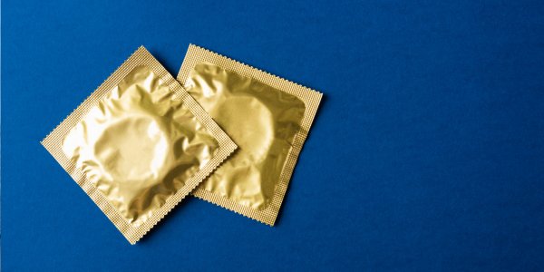 Lesbian sex education on using barriers like condoms and dental dams for safe oral sex and STI protection