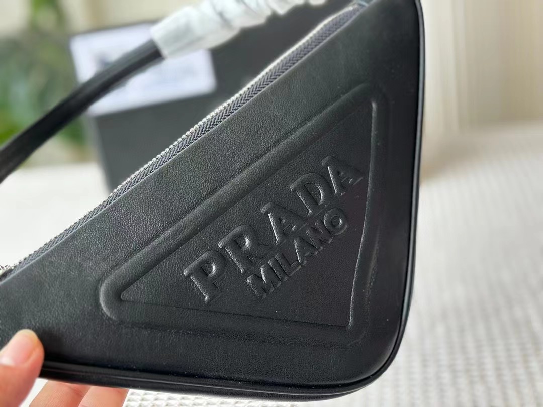Prada Triangle Pouch / clutch in black saffiano leather