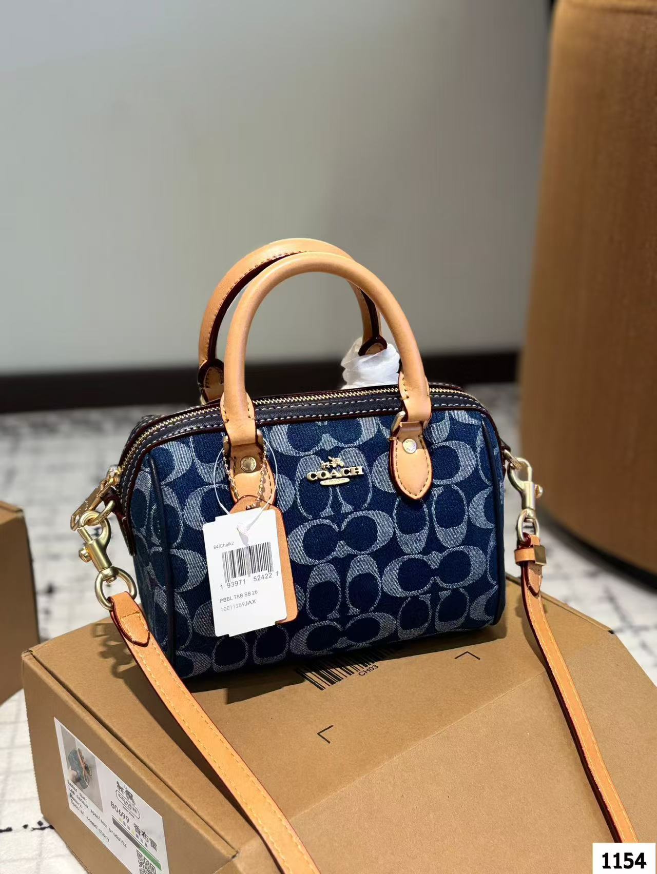 Coach Denim Pillow Bag