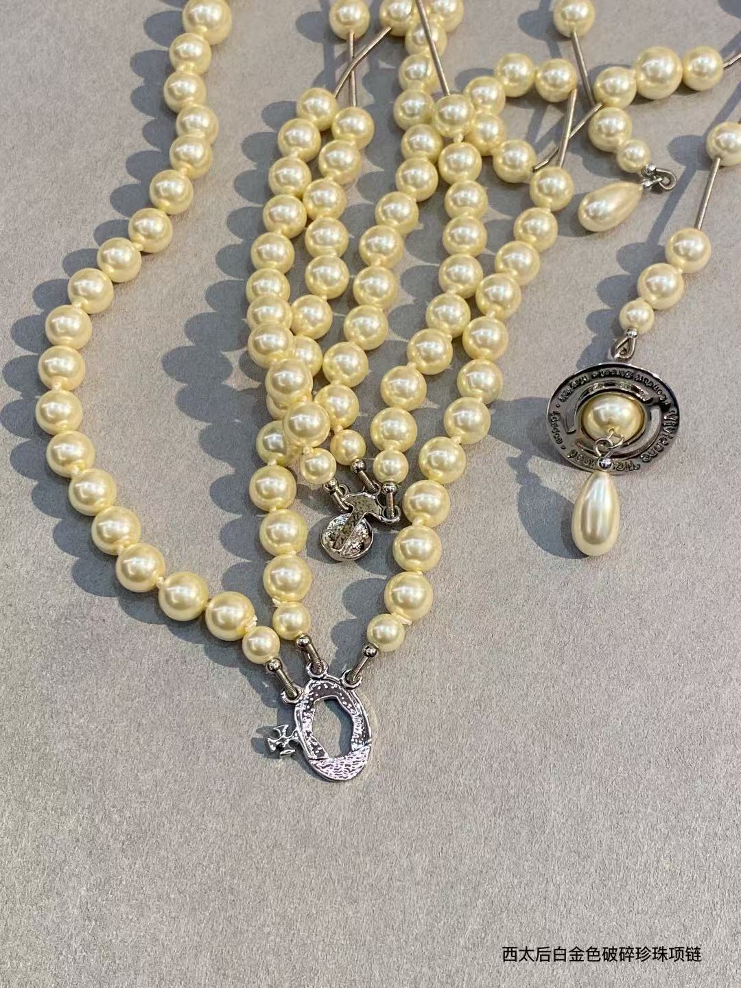 Vivienne Westwood asymmetrical three-dimensional pearl pendant necklace