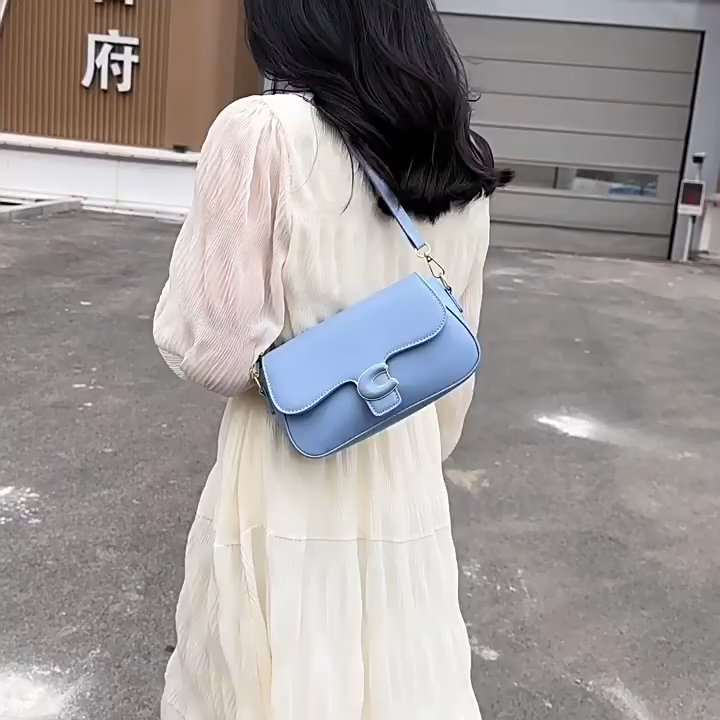 Coach chain saddle crossbody bag