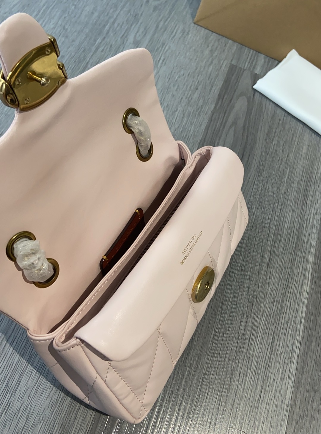 Coach quilting tabby