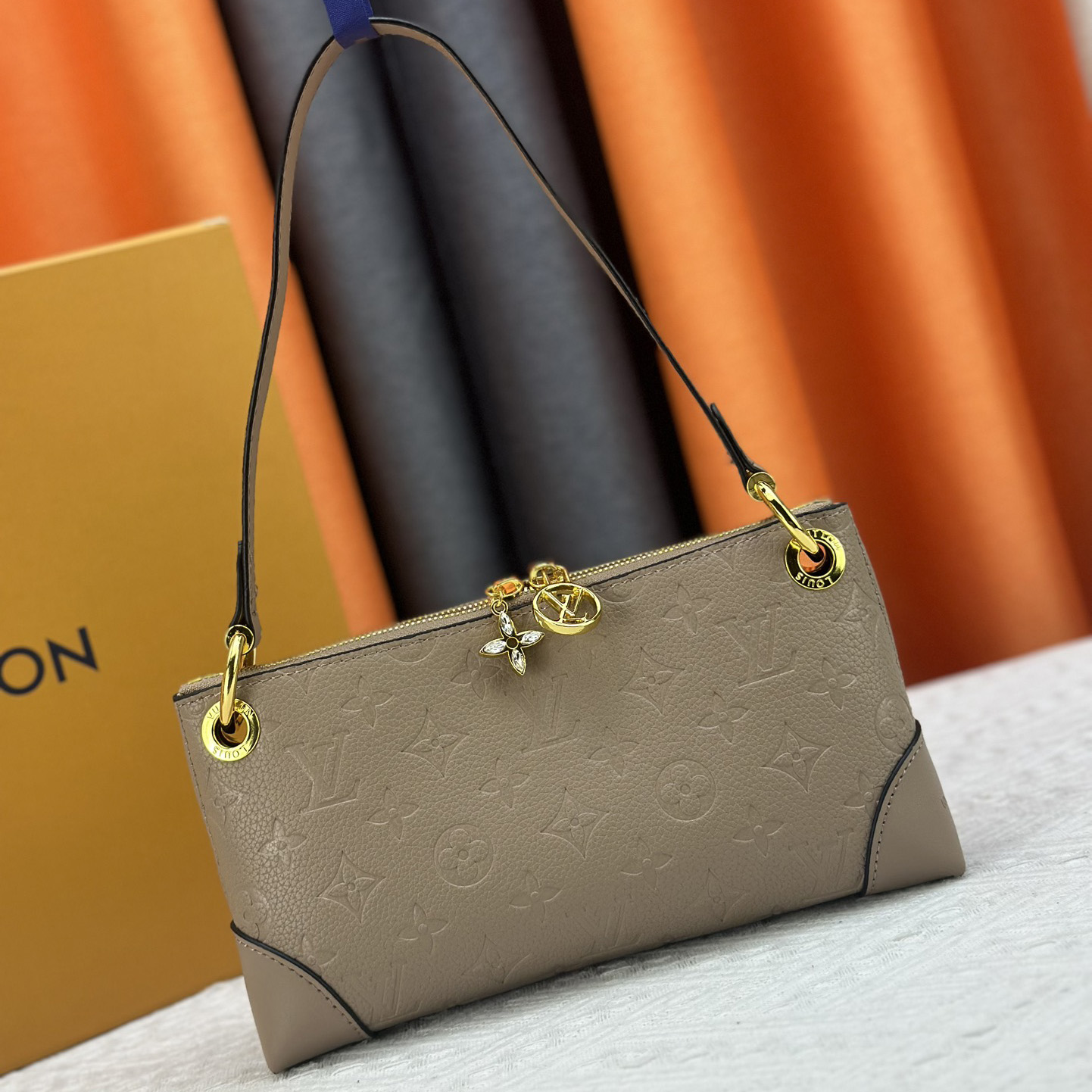 LV armpit shoulder bag