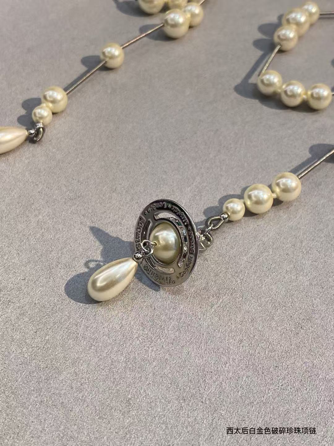 Vivienne Westwood asymmetrical three-dimensional pearl pendant necklace