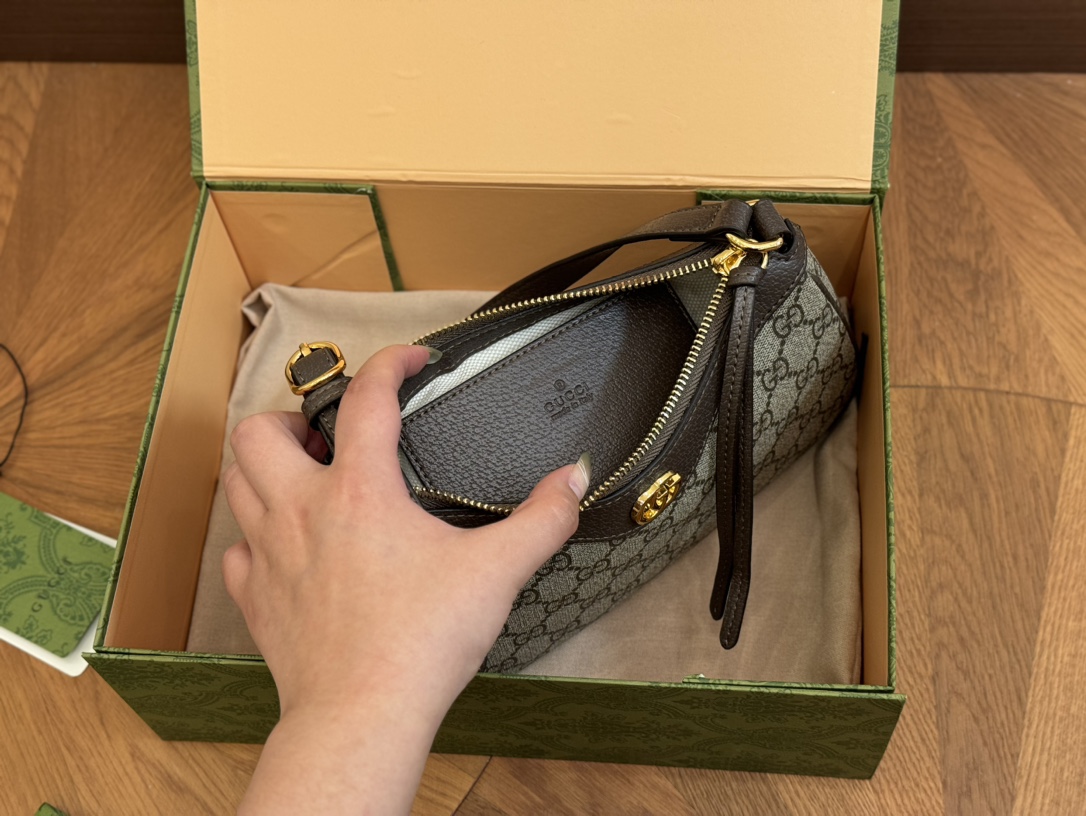 Gucci monogram armpit bag