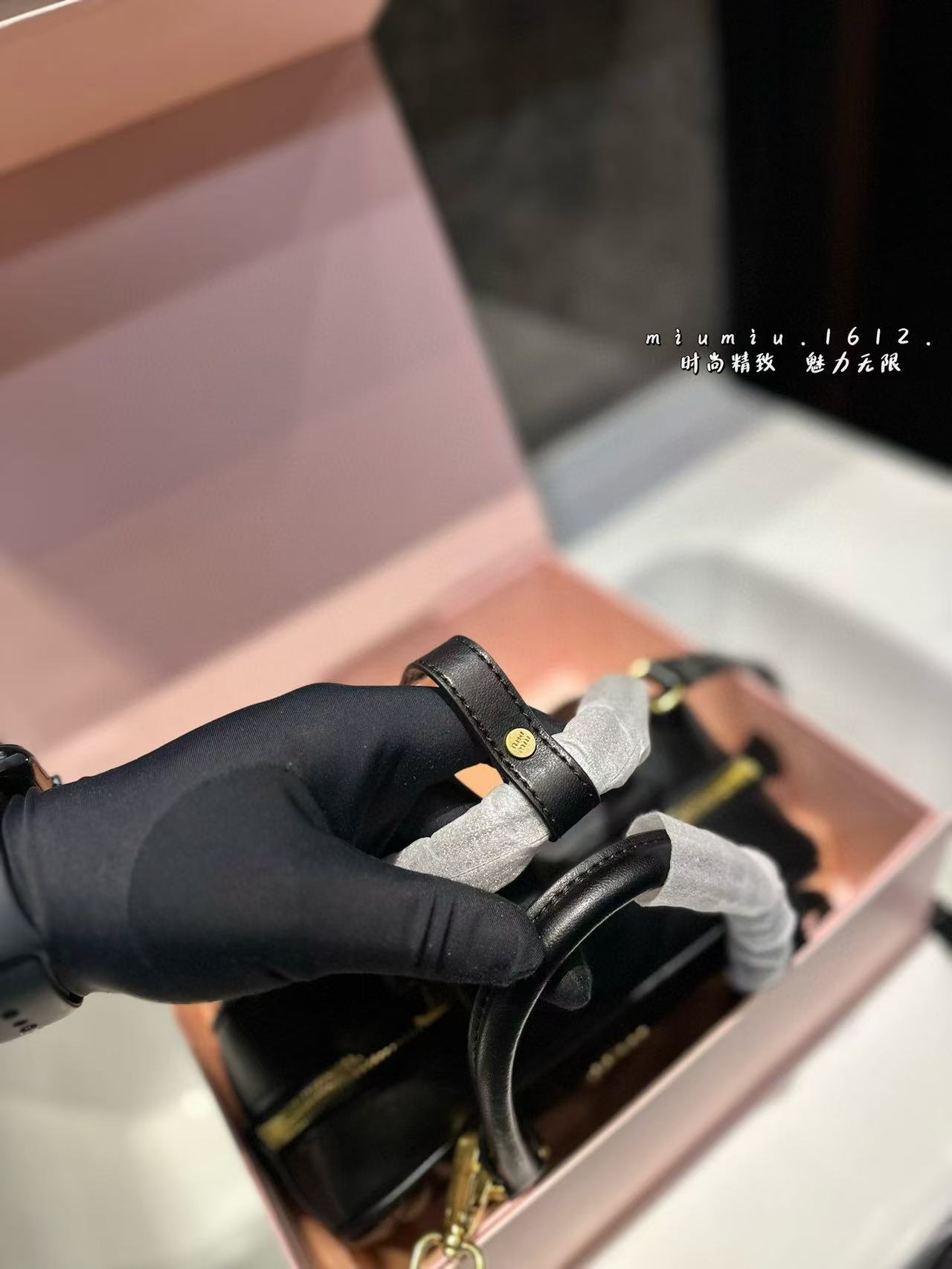 Miumiu Aracdie pleated bowling bag