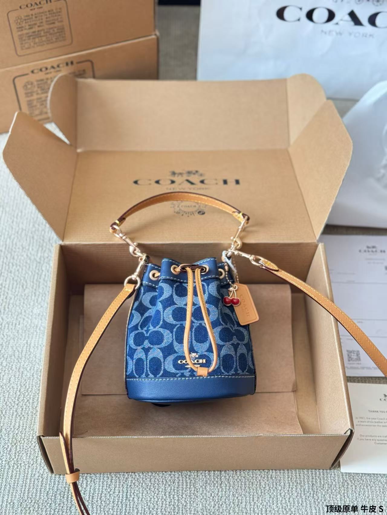 Coach dempsey 14 mini bucket bag