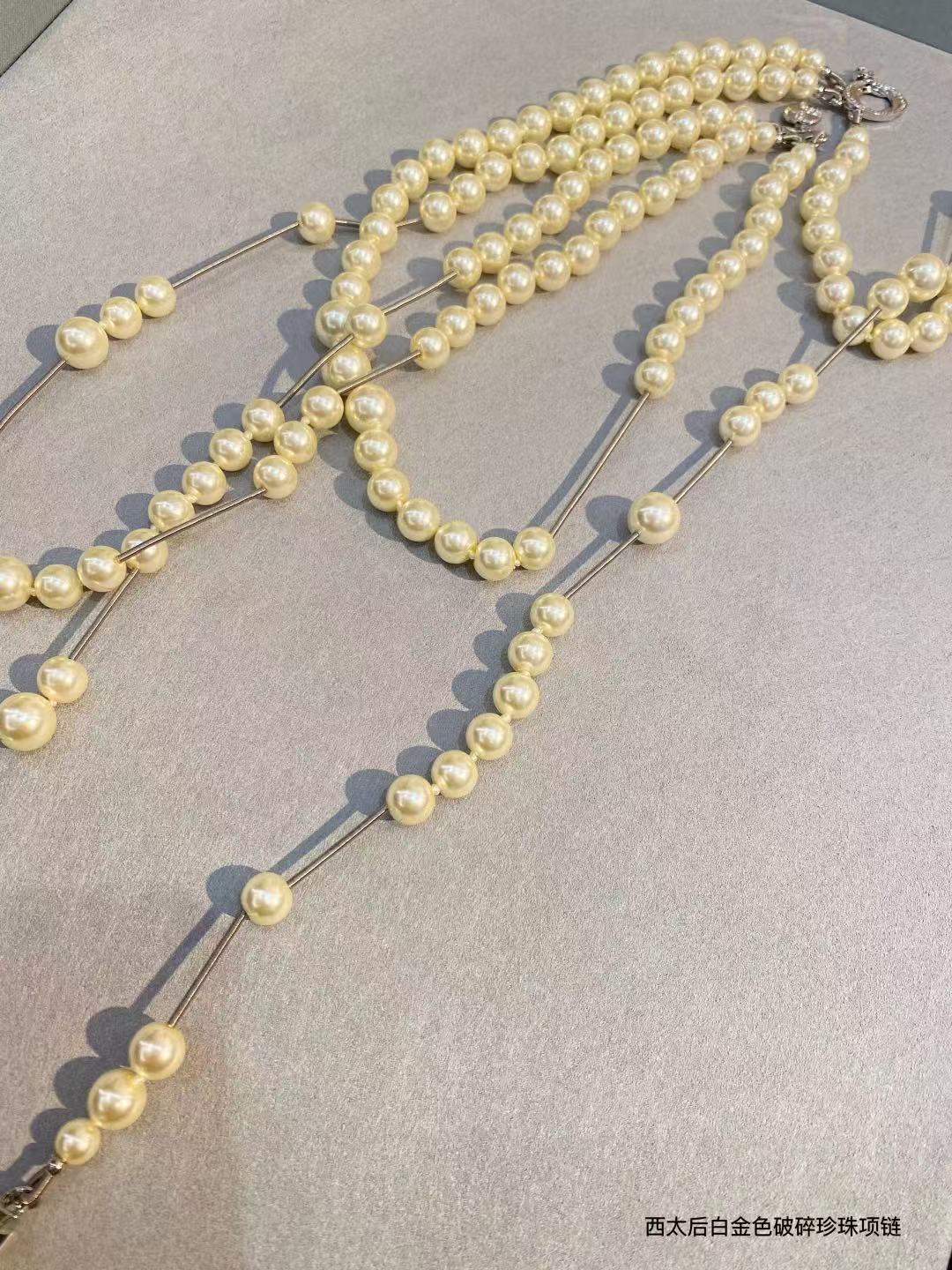 Vivienne Westwood asymmetrical three-dimensional pearl pendant necklace