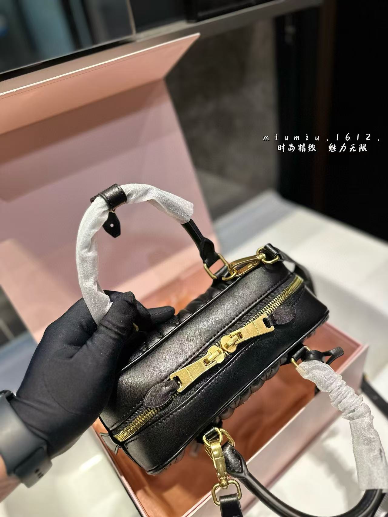 Miumiu Aracdie pleated bowling bag