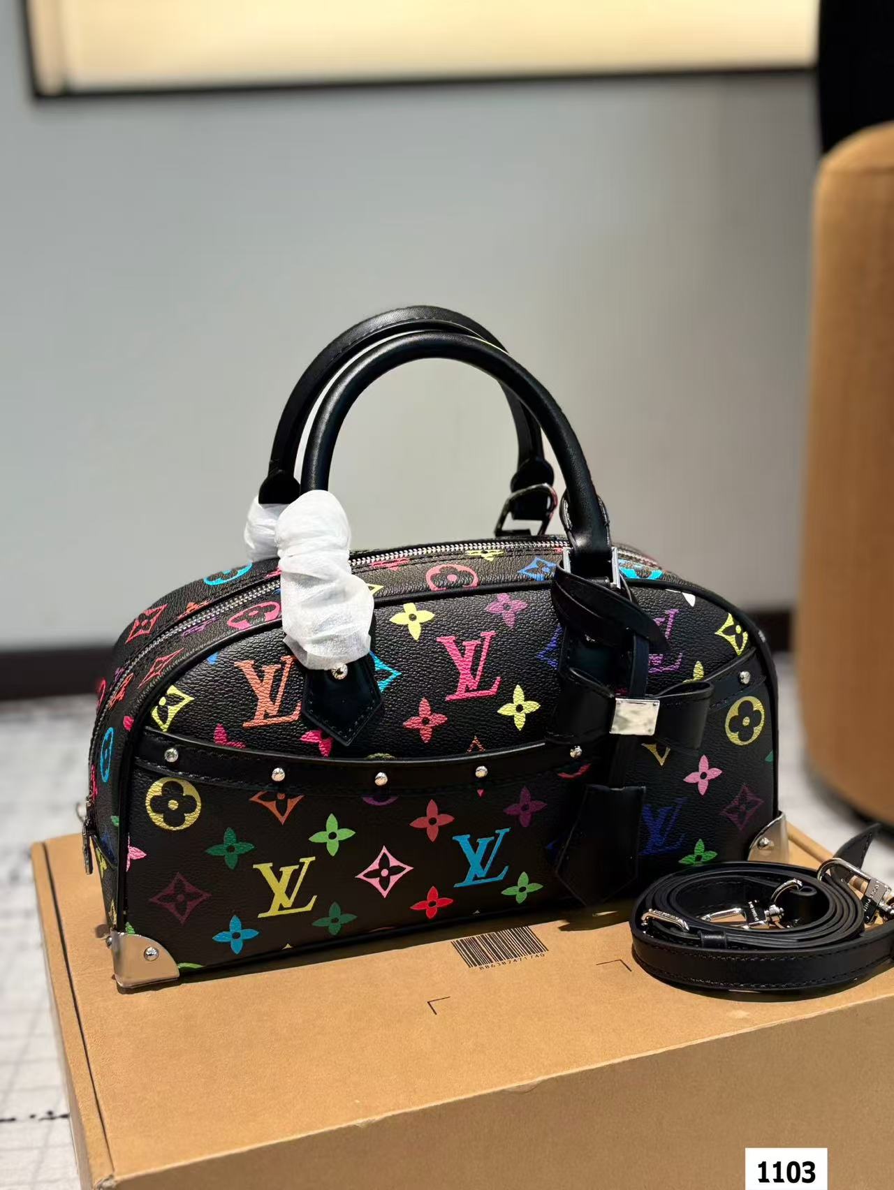 LV multi-colored pillow bag