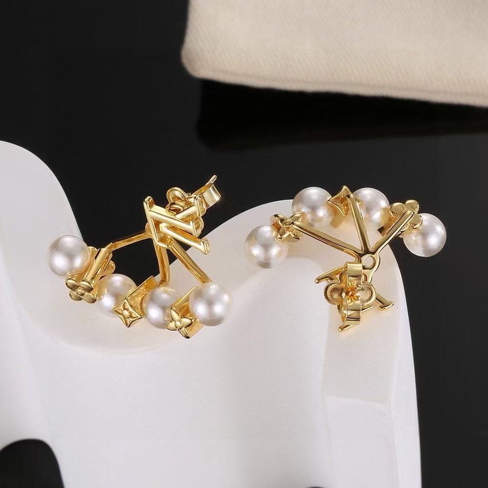 LV letter flower stud earrings