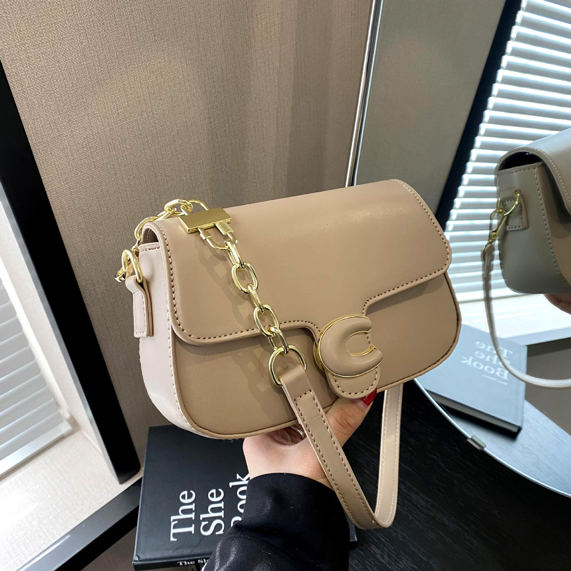 Coach chain saddle crossbody bag