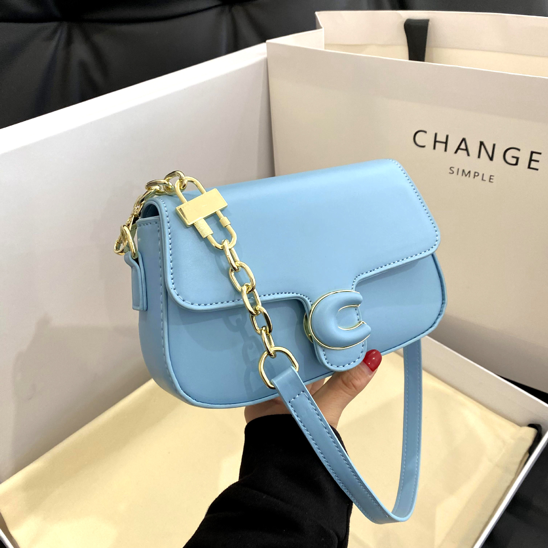 Coach chain saddle crossbody bag