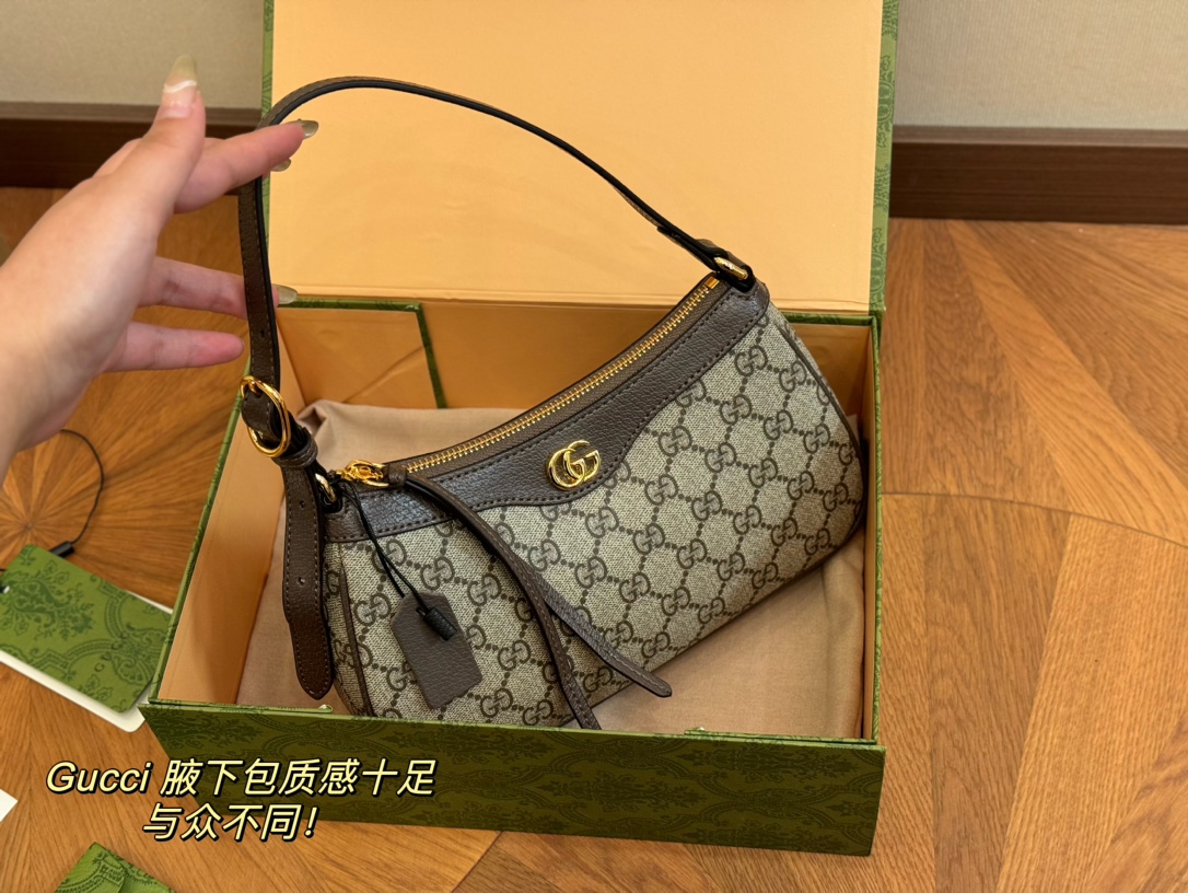 Gucci monogram armpit bag