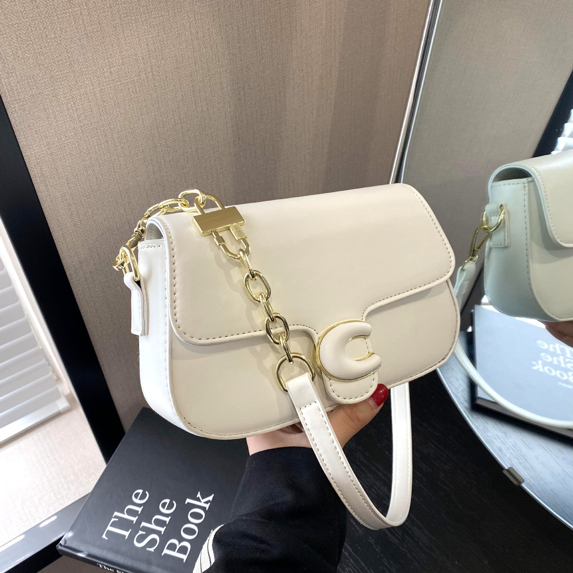 Coach chain saddle crossbody bag