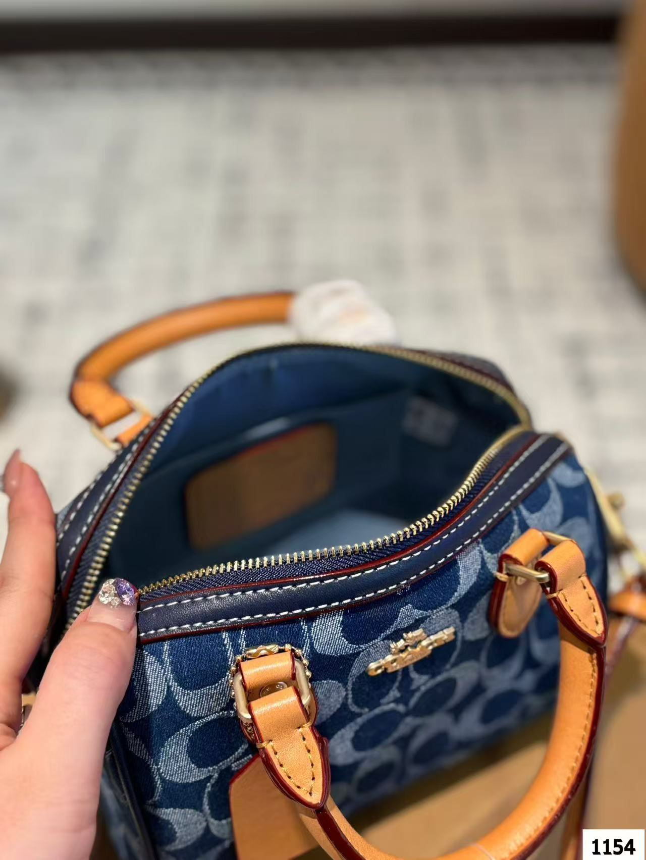 Coach Denim Pillow Bag