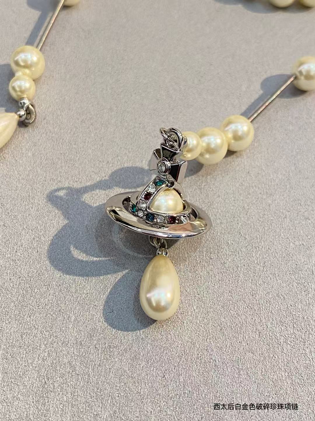 Vivienne Westwood asymmetrical three-dimensional pearl pendant necklace