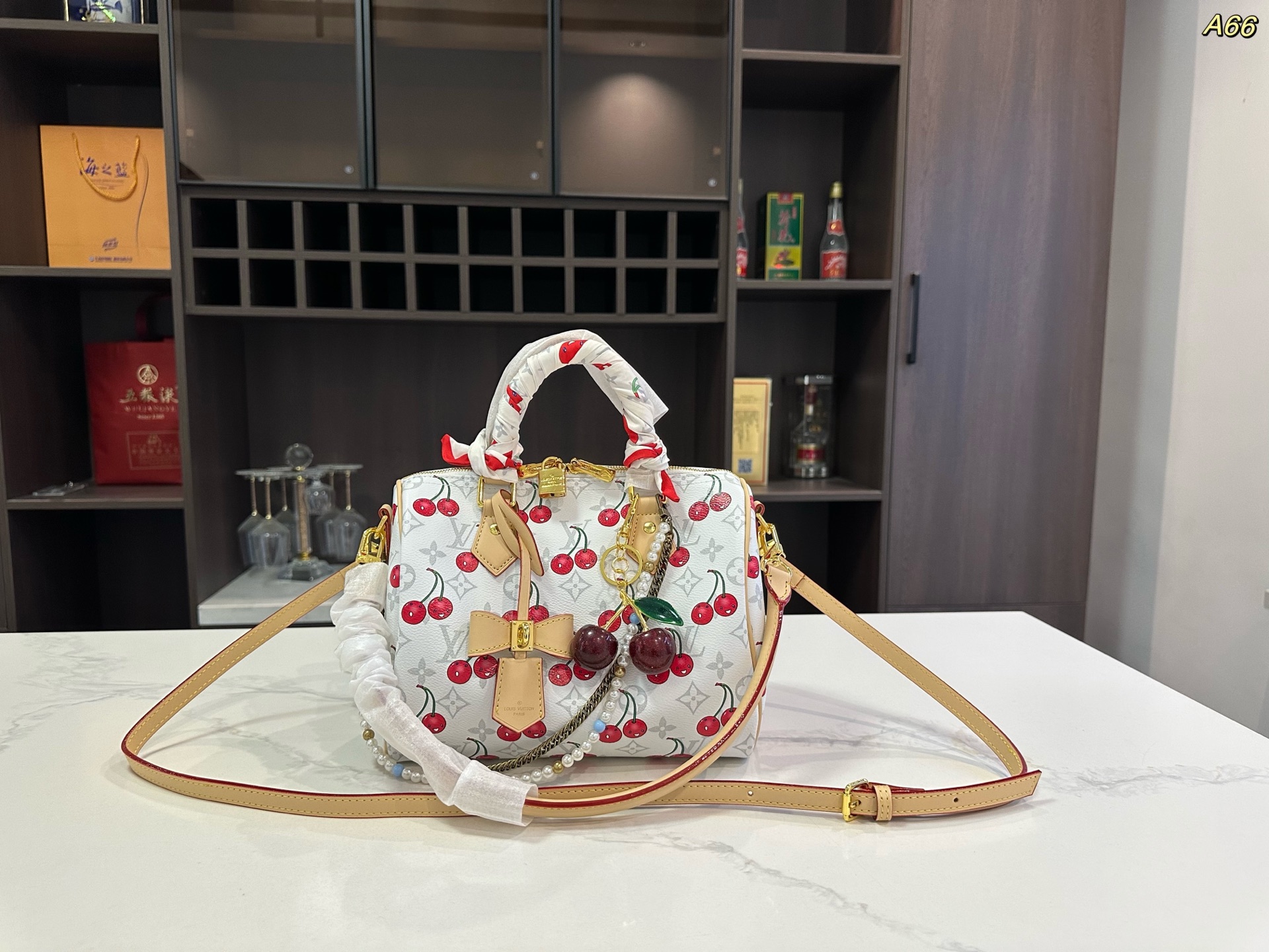 LV cherry pillow bag