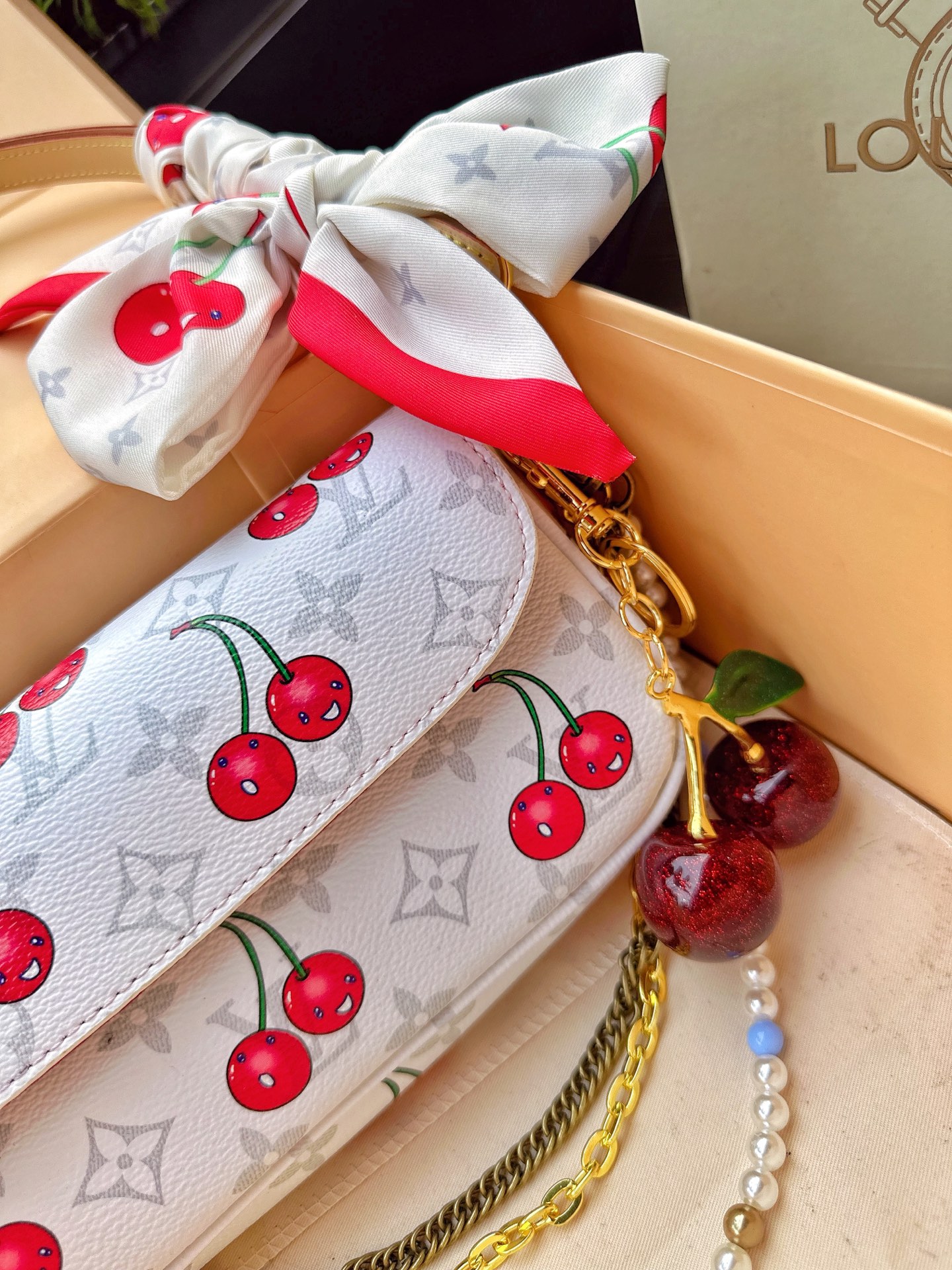 LV ivy woc cherry bag