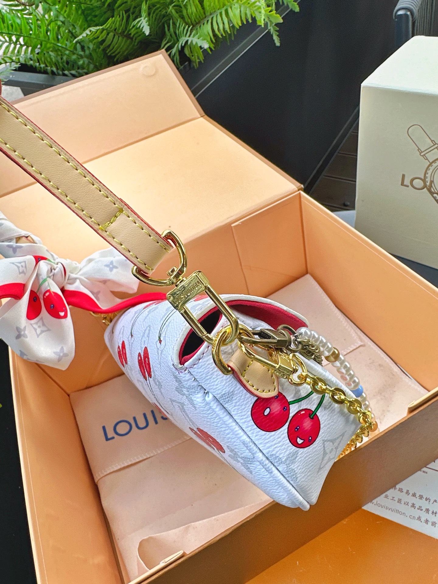 LV ivy woc cherry bag