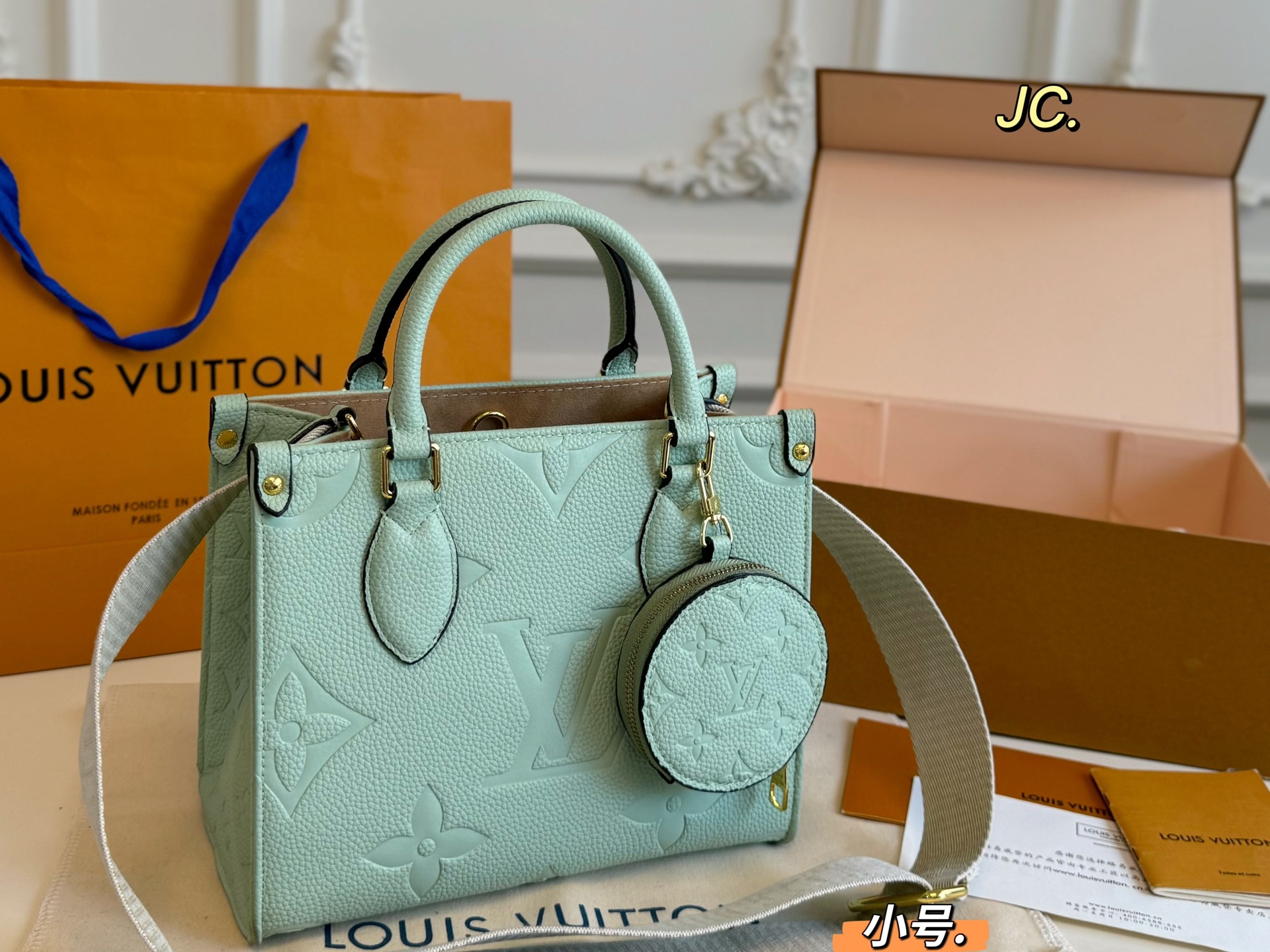 LV onthego embossed jungle tote bag