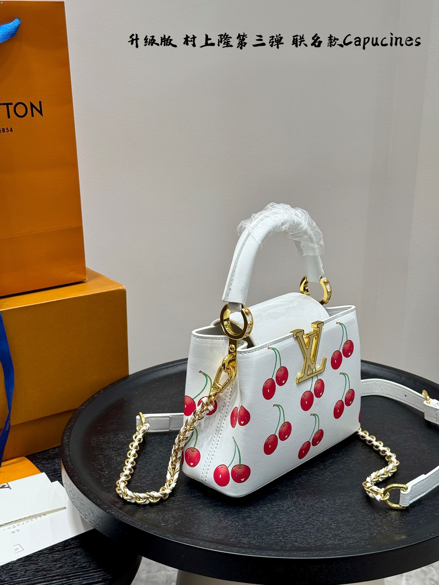 LV capucines cherry handbag