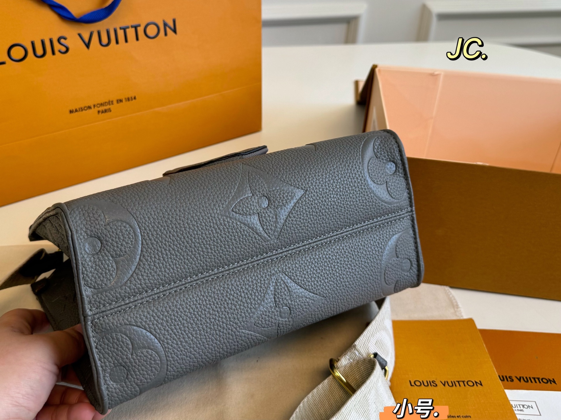 LV onthego embossed jungle tote bag