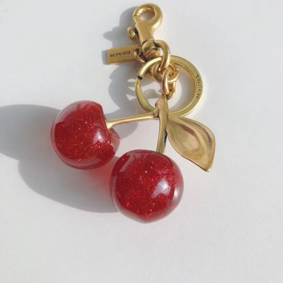 Coach cherry keychain