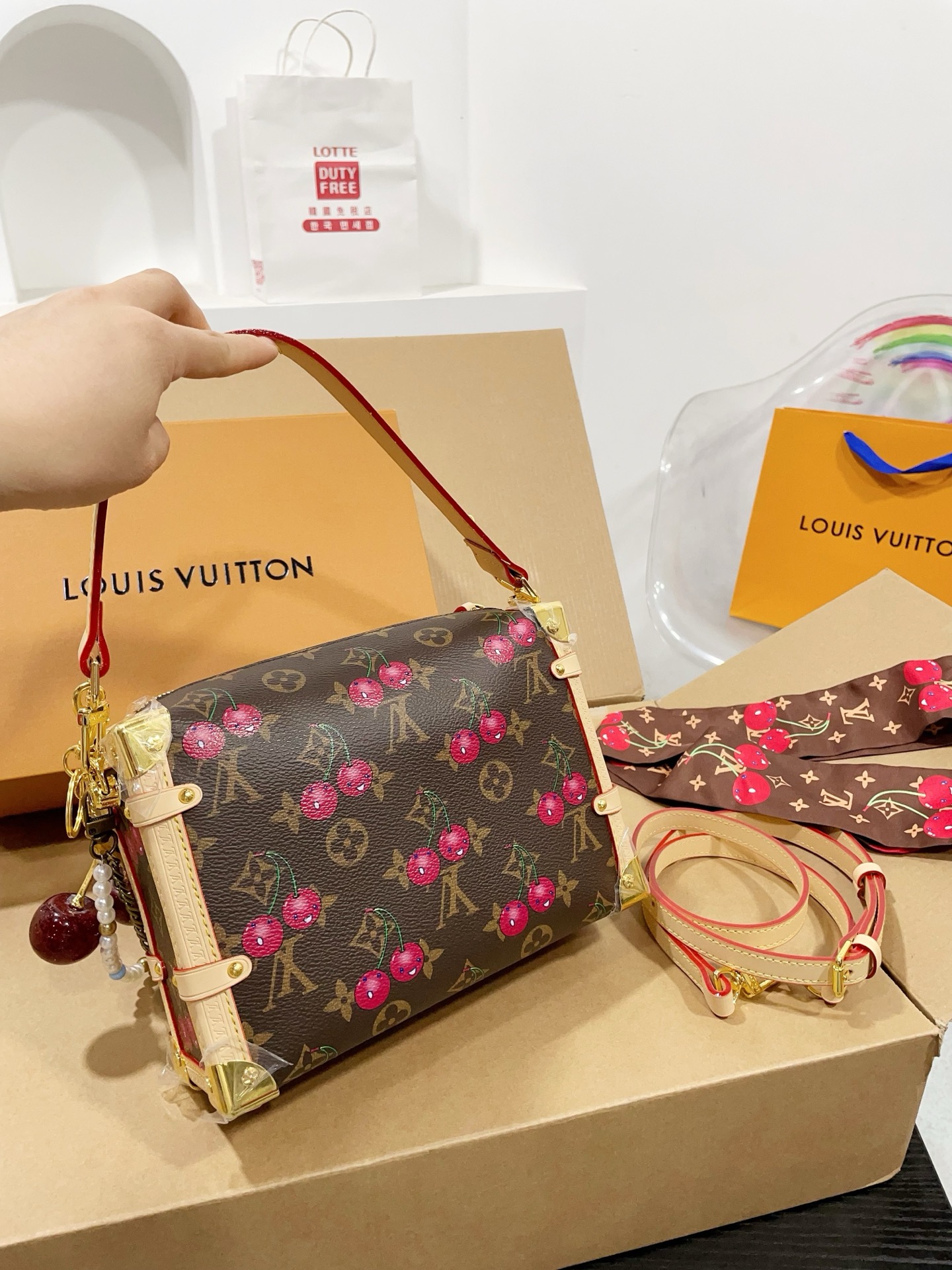 LV Side trunk cherry bag