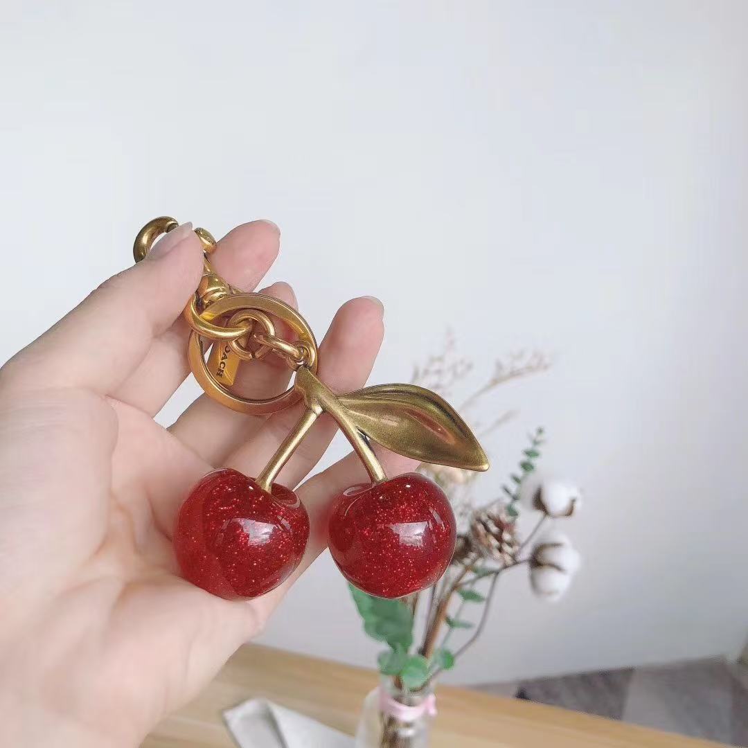 Coach cherry keychain