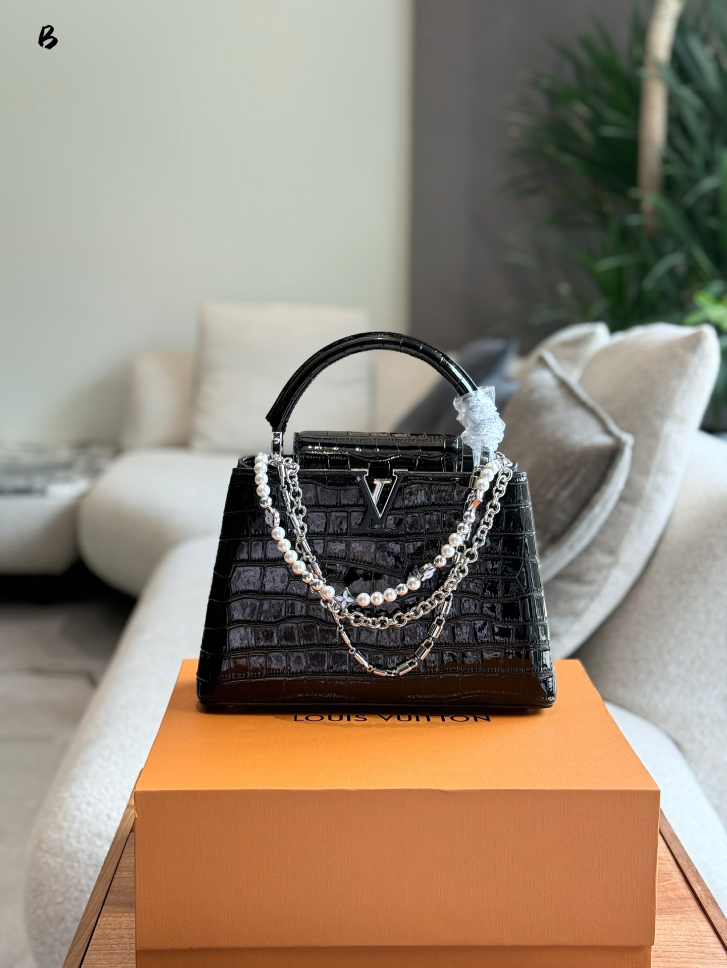 LV Capucines crocodile print handbag
